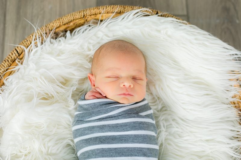 newborn photo of baby in a basket