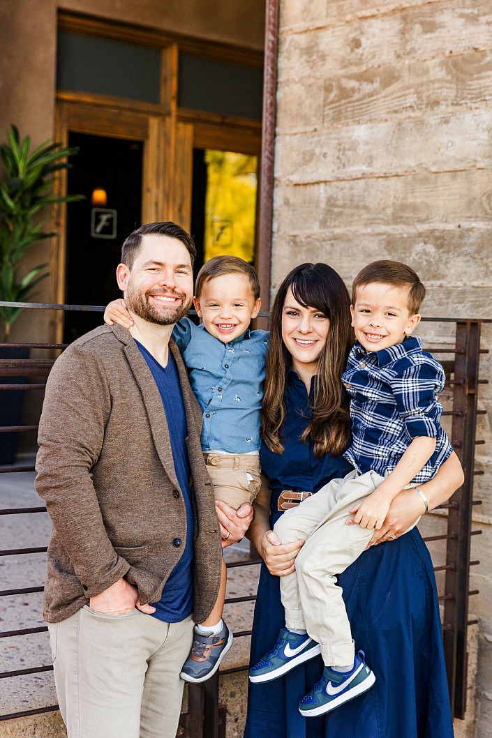family hugging with heads close together in san tan valley
