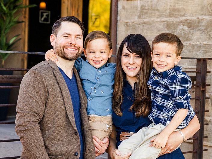 family hugging with heads close together in san tan valley